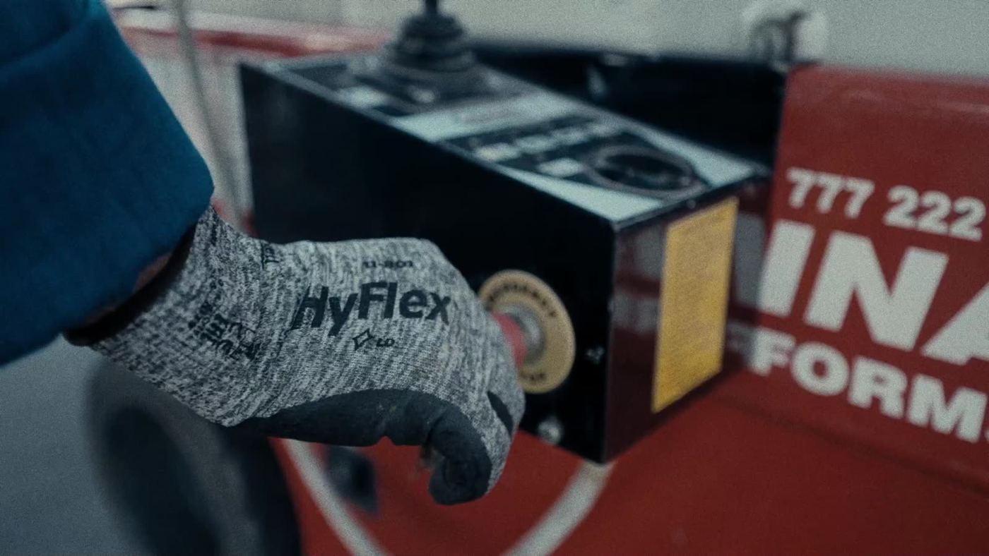 Technician servicing fuel station equipment